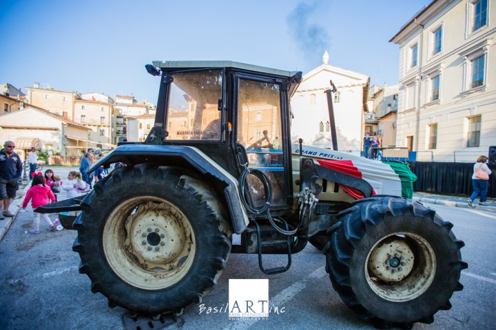 The demonstration in piazza: Flag draped over the tractor