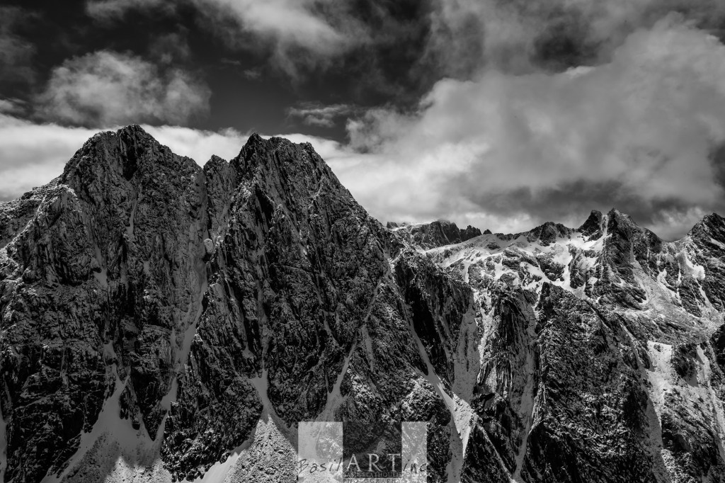Craggy snowdusted Andean Peaks
