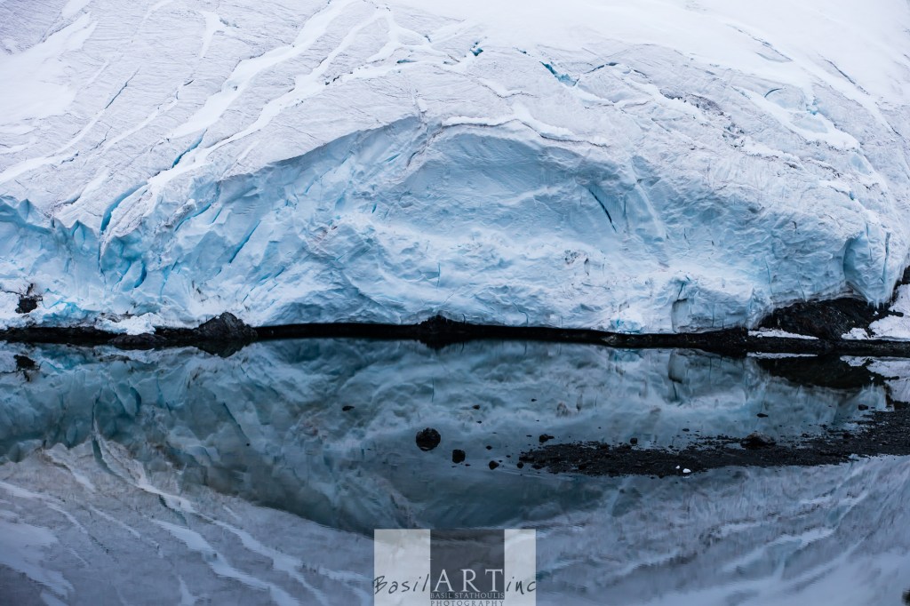 Glacier mouth in black water 
